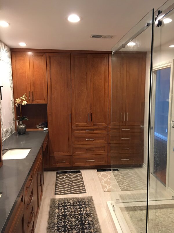Full-height bathroom cabinetry and vanity