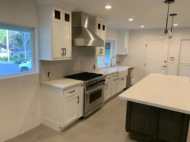 Bright shaker-style kitchen with contrasting island